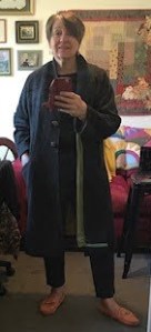 Margot wearing the saved coat